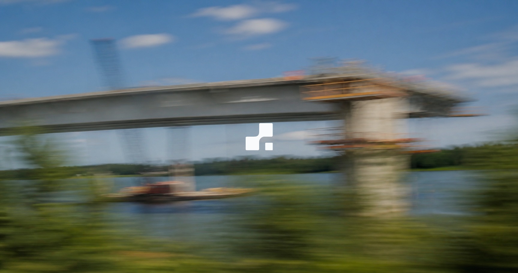 Motion-blurred summer view of a bridge under construction over a river, overlaid with the Aplon mark